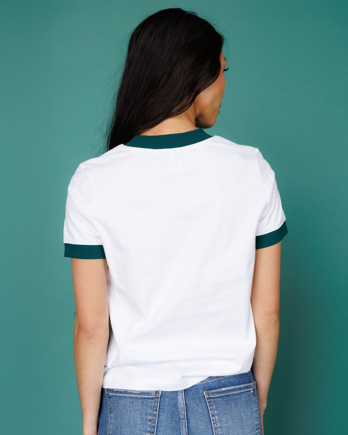 Bright white ringer T-shirt with dark green collar trim, back view