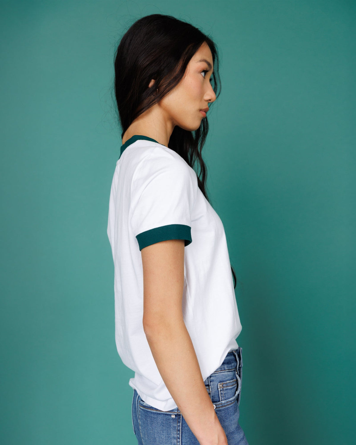 Bright white ringer T-shirt with dark green trim, short-sleeve side view