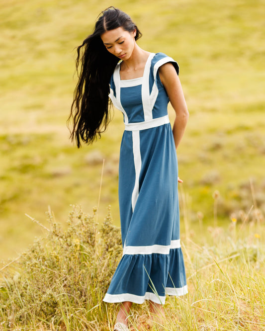 Women’s Block Party dress in blue with white trim panel and tiered skirt