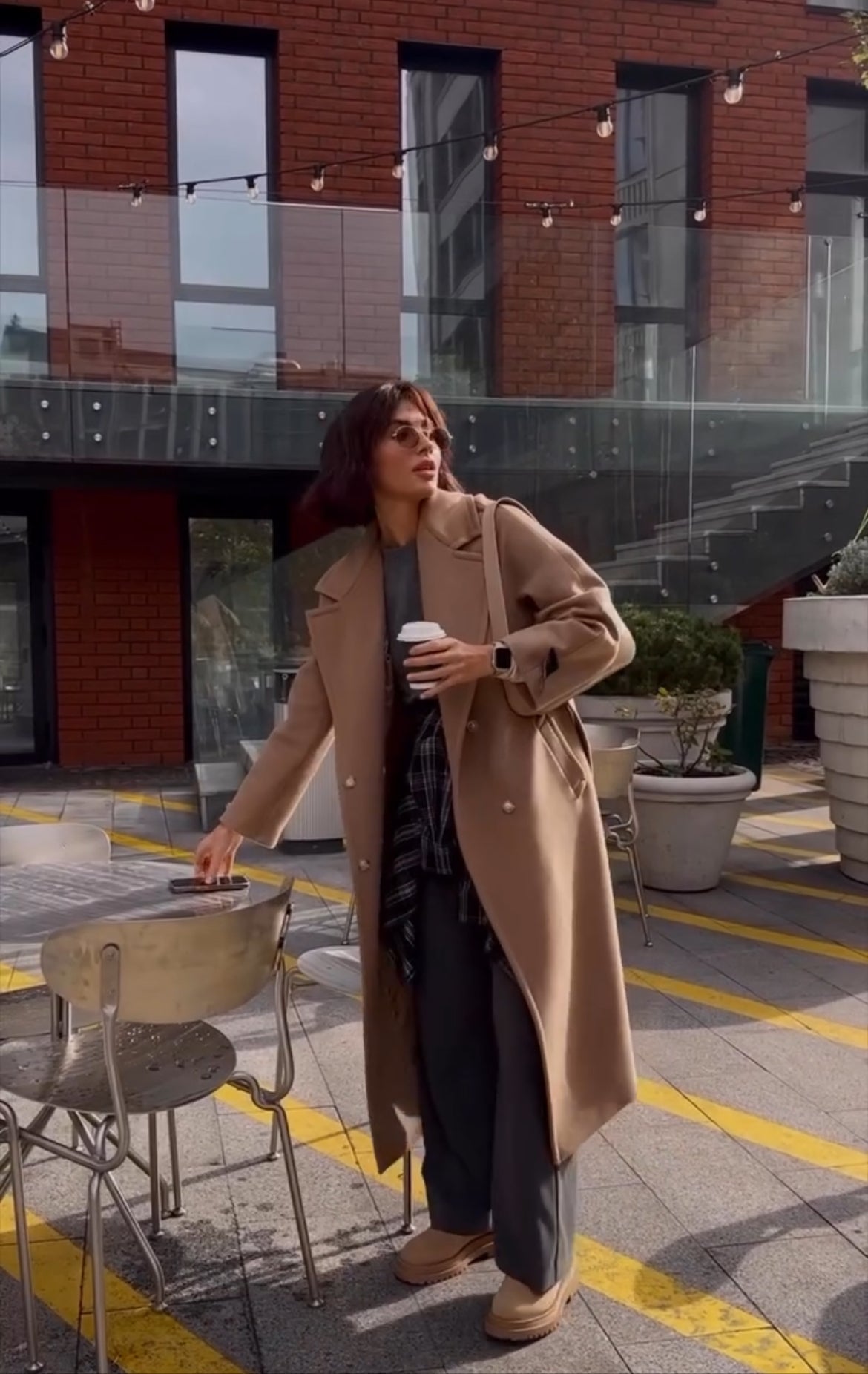 Camel wool-blend coat with button front, wide lapels and long hem