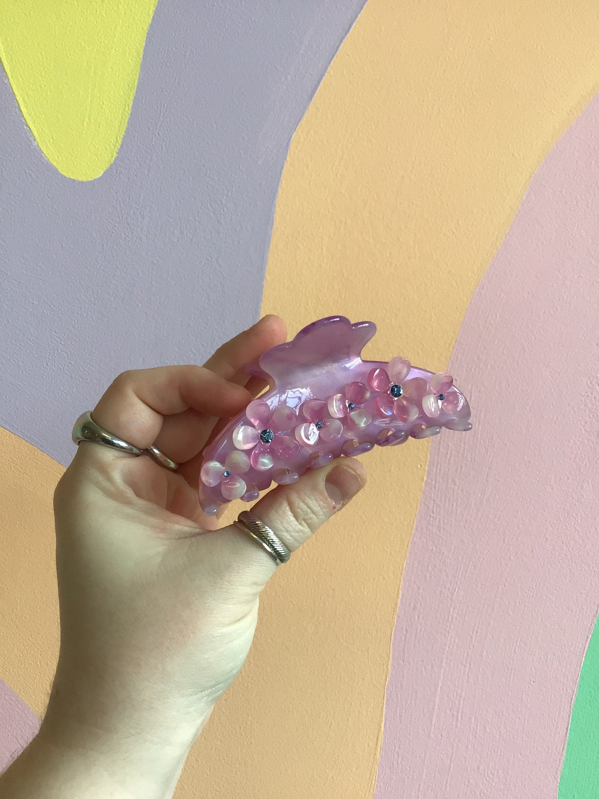 Appliqué flower hair claw clip in translucent pink and purple