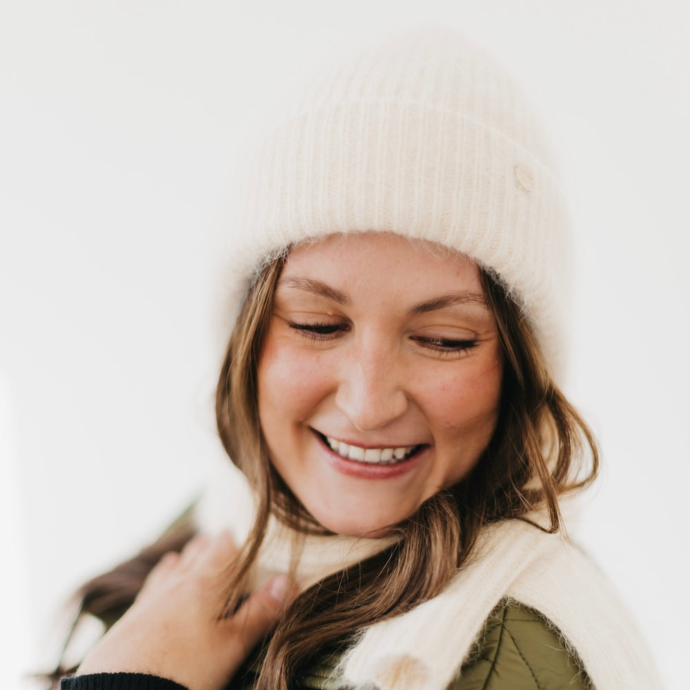 Cream beanie with matching cream scarf, ribbed knit texture