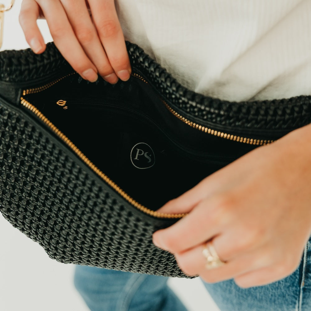 Black woven bum bag interior with gold zipper and PS logo tag