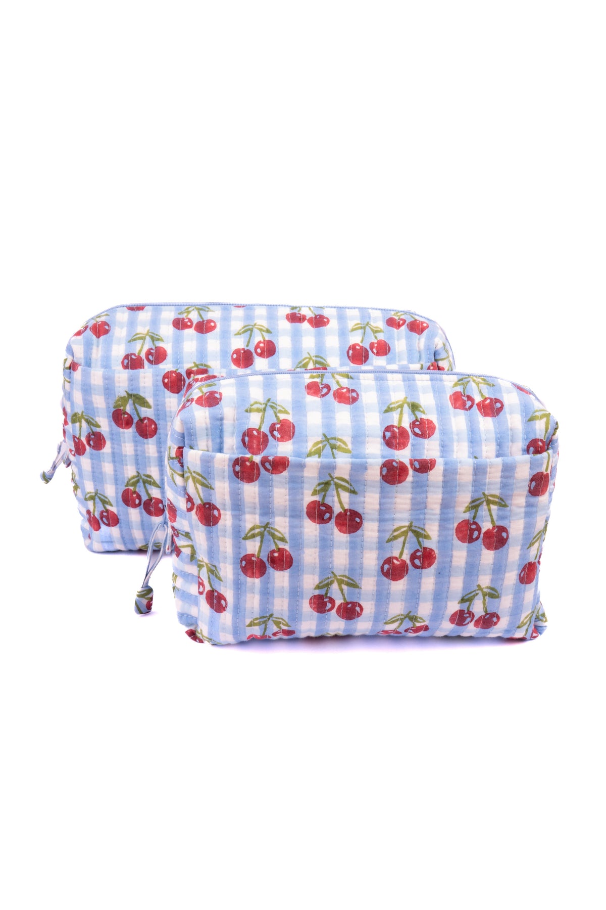 Zippered cherry-print makeup bag on blue check fabric, with side tie cords