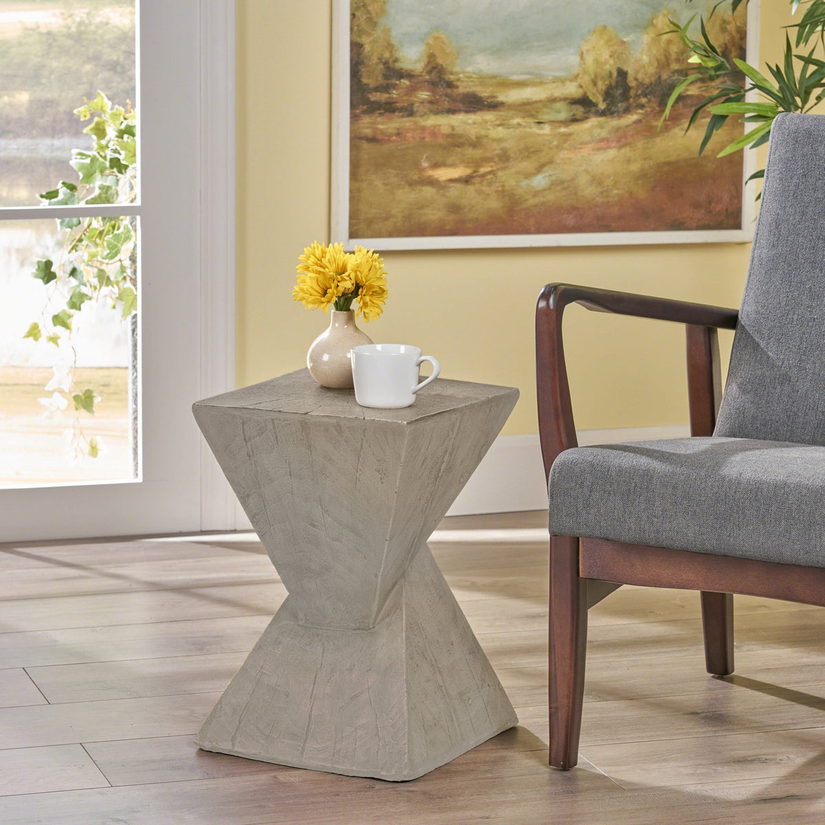 TESS light gray side table with an hourglass-shaped base and wood-like texture