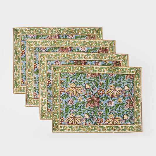 Set of four cotton placemats with green and blue floral hand-block print and ornate border
