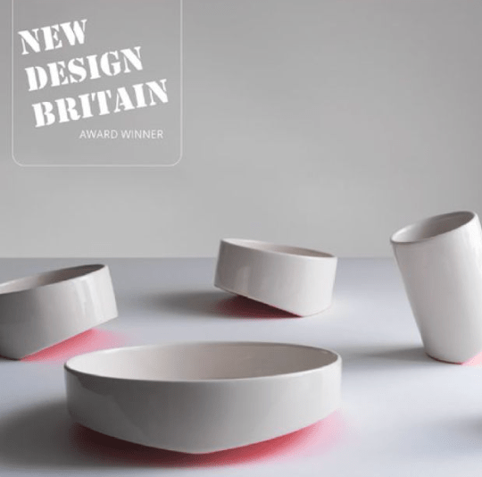 Ceramic cups and a wide bowl, smooth white finish with open rims