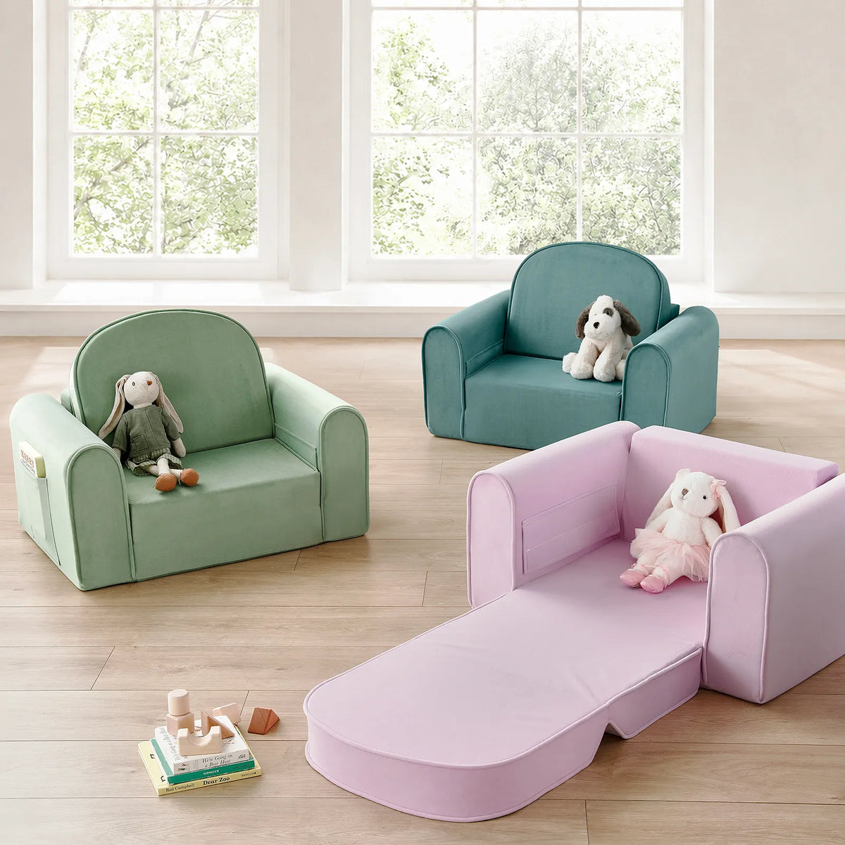 Tiny Land® kids sofa chairs in green and teal, with a purple chair extended into a lounger.