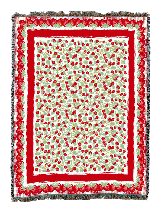 Strawberry-pattern blanket with red scalloped border and green-and-white leaf design
