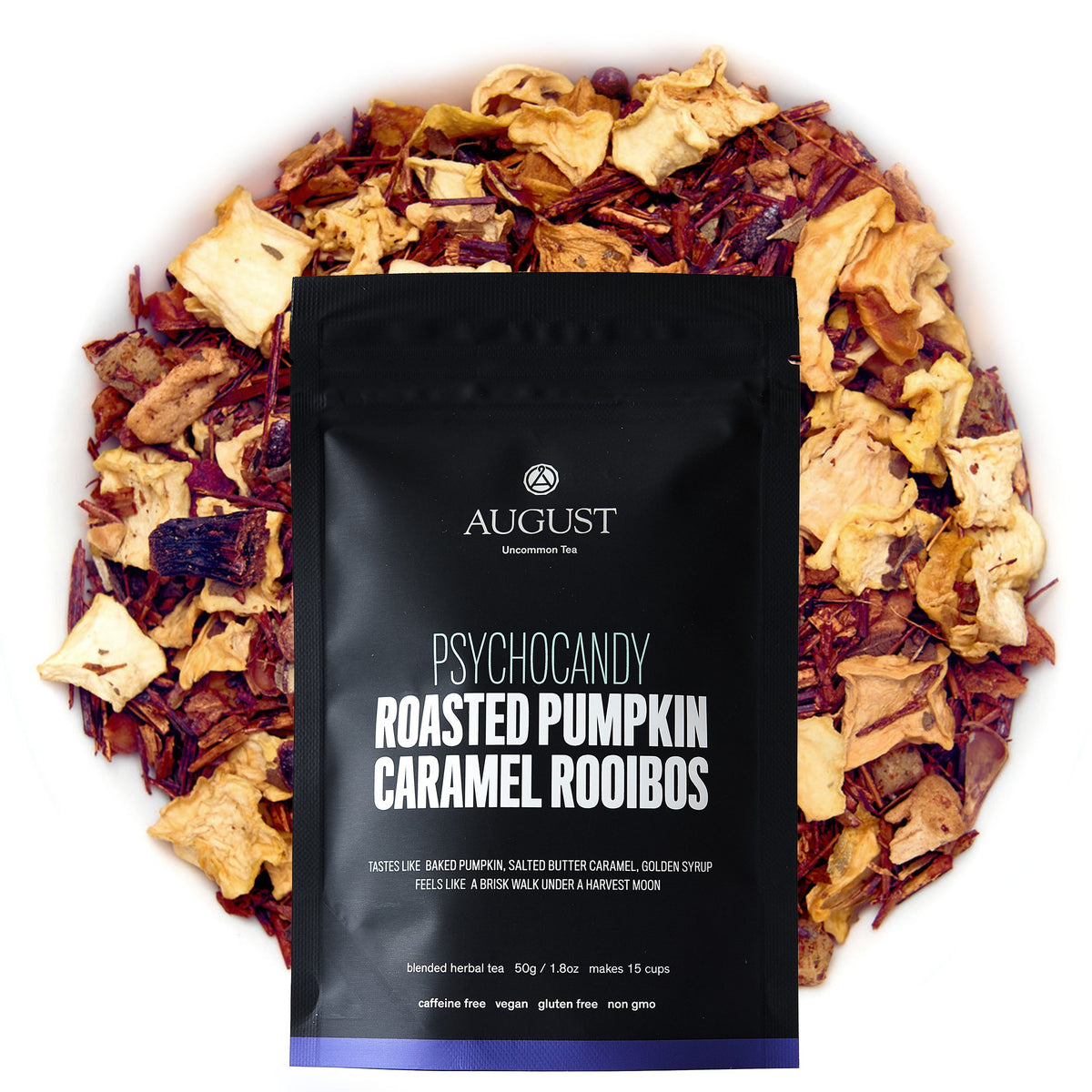 Psychocandy roasted pumpkin caramel rooibos tea pouch surrounded by loose tea blend.