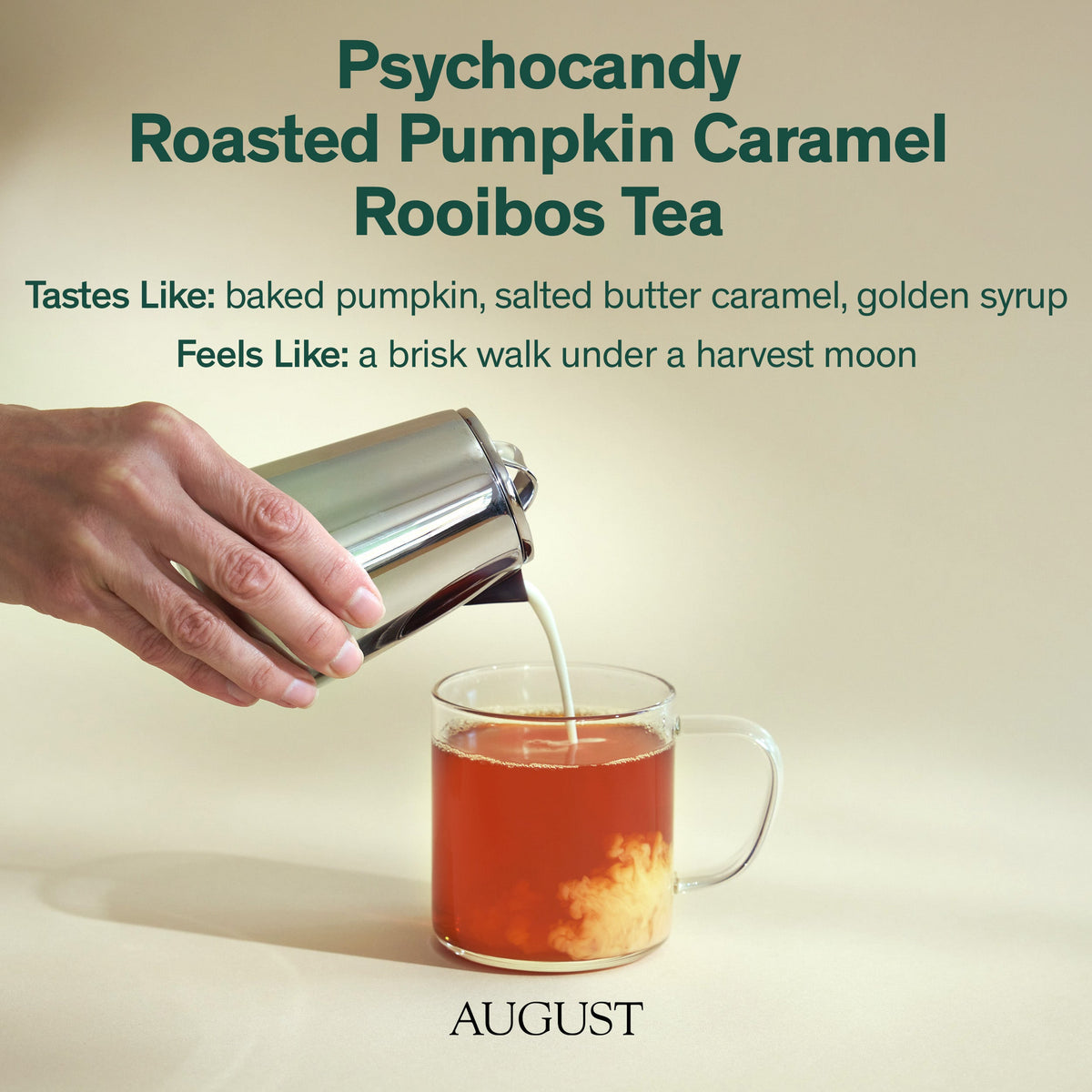 Psychocandy rooibos tea poured into a glass mug, with golden pieces settled at the bottom.
