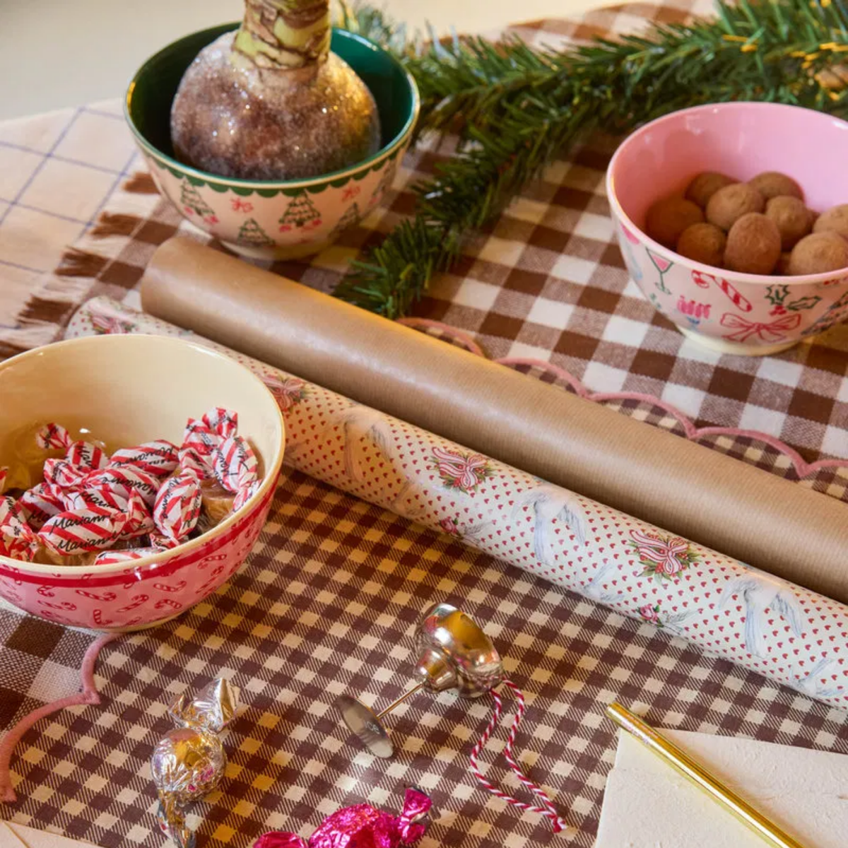 Melamine bowl with candy cane print, pink interior, on table