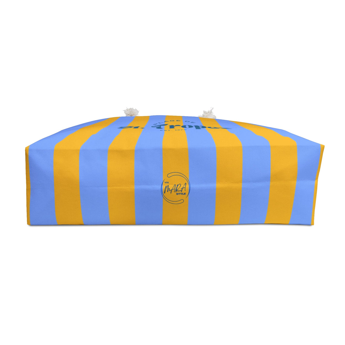 Striped beach tote laid flat, blue and yellow vertical stripes with front emblem