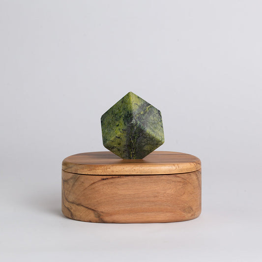 Oval wooden jewel box with green stone octagonal knob on lid