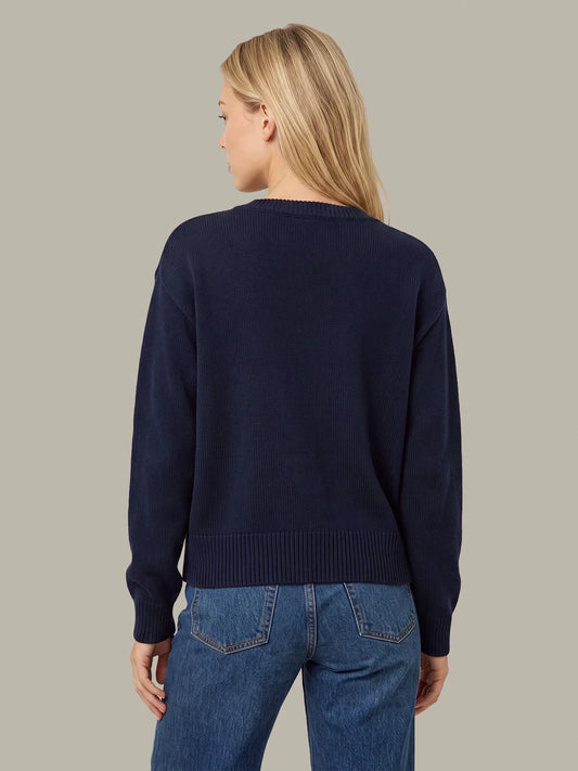 Navy crewneck knit sweater, ribbed cuffs and hem; plain back
