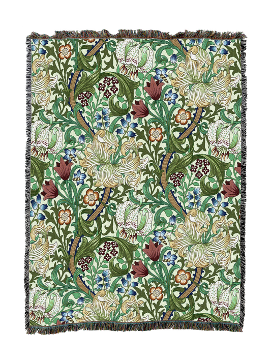 William Morris Golden Lily blanket with green floral vine pattern and tassel fringe