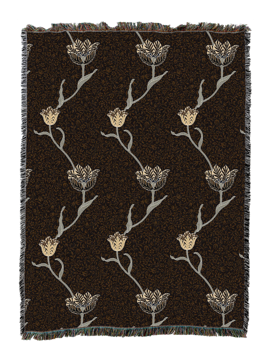 Garden tulip blanket with dark brown backdrop and gold, gray tulip stems; fringed border