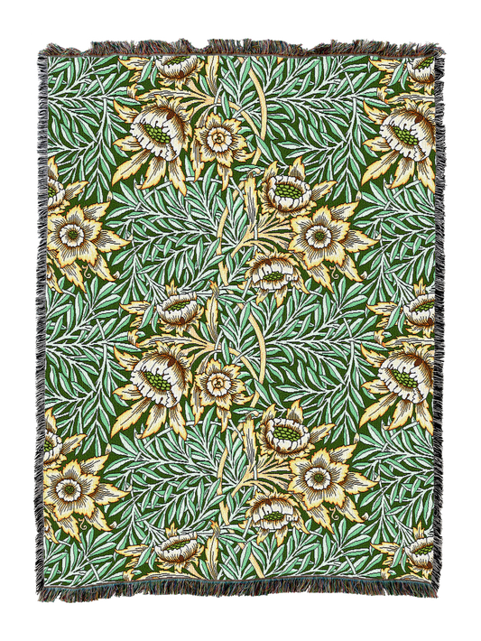 Teal floral blanket with tulip-and-willow pattern, fringed border and stitched edge