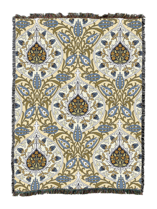 Cream rosebud floral blanket with swirling motifs in blue and brown, tassel fringe edges