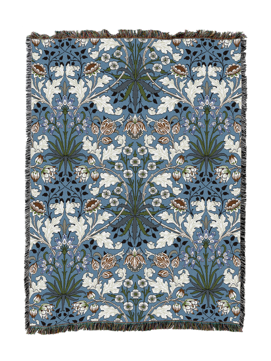 Blue floral hyacinth blanket with leafy vines and tassel fringe border