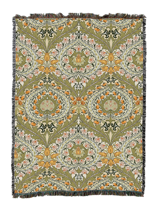 Eden blanket with repeating oval medallions, leafy swirls, and fringed edge trim