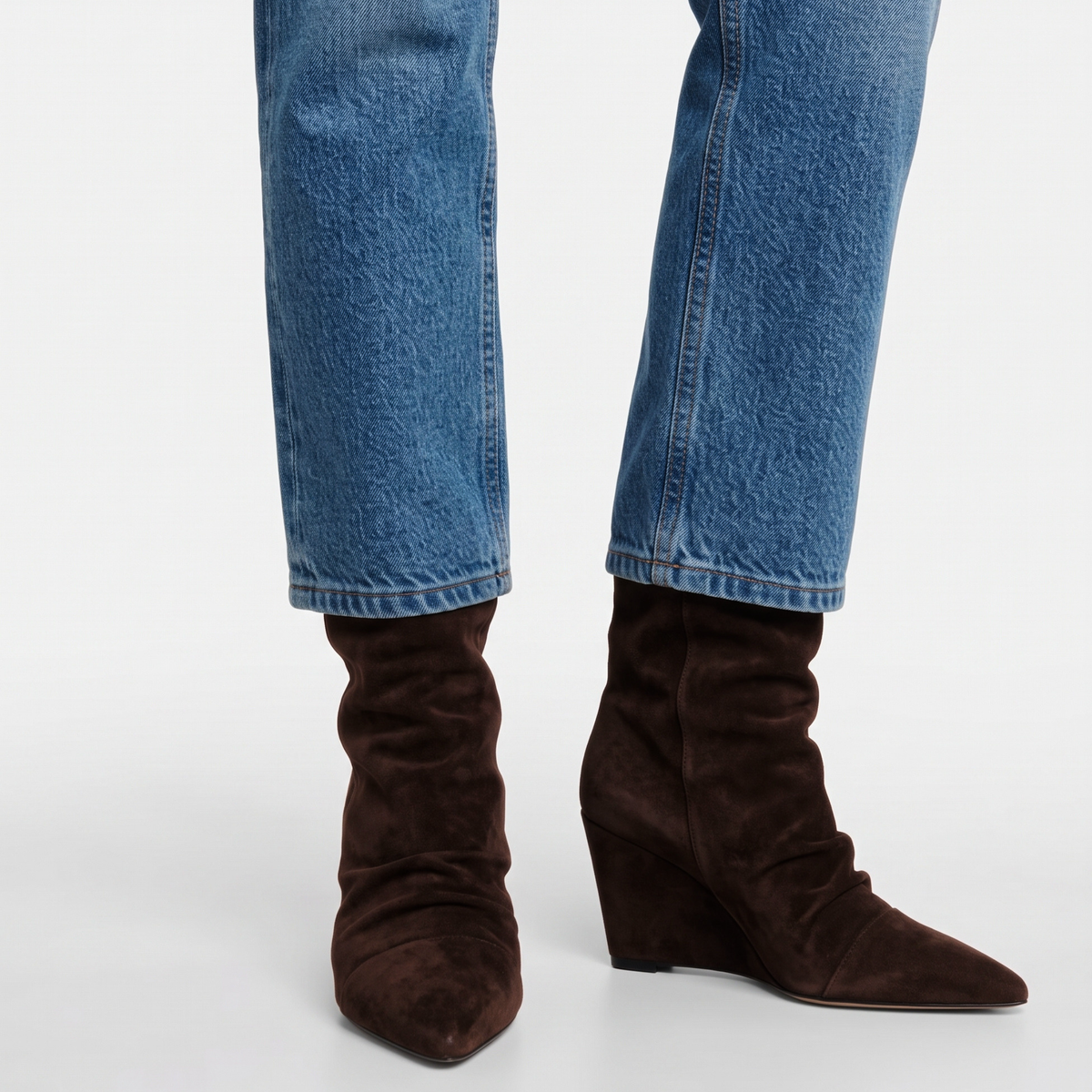 Dark brown suede slouch wedge boots with low wedge heel, pair standing view