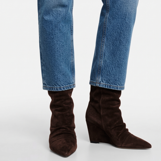 Dark brown suede slouch wedge boots with low wedge heel, pair standing view
