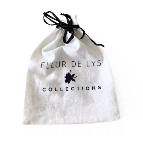 Fleur de Lys Collections drawstring jewelry pouch, white with black bow