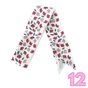 White scarf with maroon heart and green leaf print
