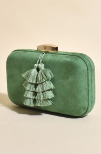 Green faux suede clutch with gold chain, curved frame, top clasp and tassel