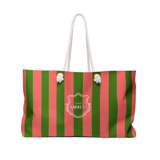Green and coral striped weekender tote with white rope handles and clover accents