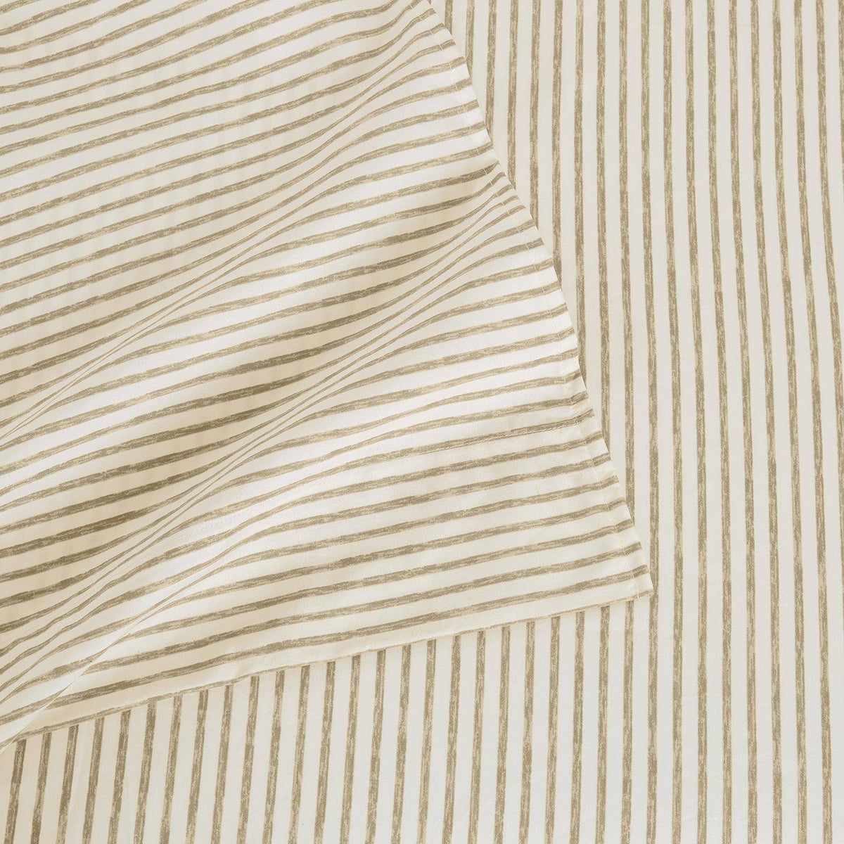 Microfiber sheet set close-up with tan and white vertical pinstripes