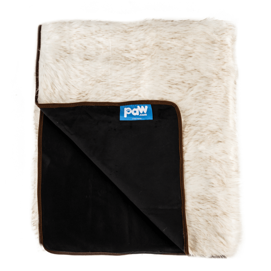 Folded white shaggy waterproof blanket showing black backing and brown border, Paw.com tag