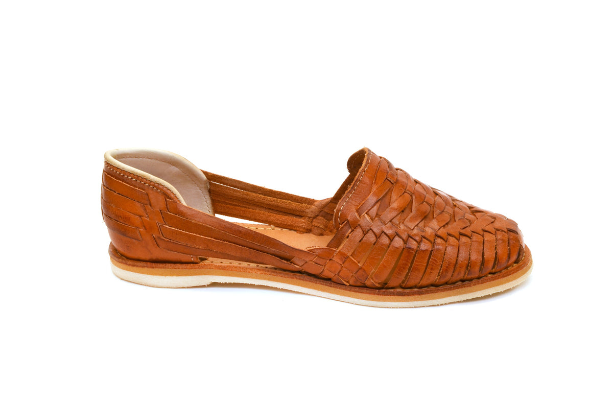 Women's cross-woven huarache flats, cognac-brown woven upper with low white sole