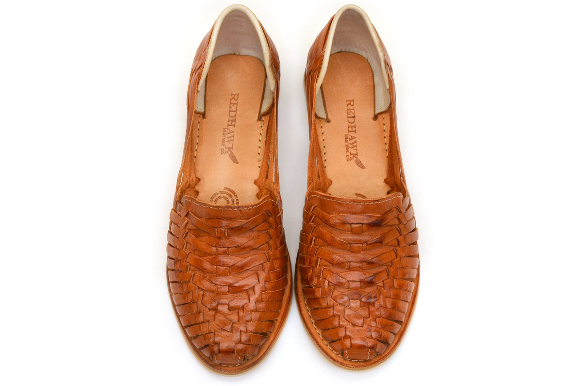 Women's cross-woven huarache flats, cognac-brown pair with rounded toe and knit weave