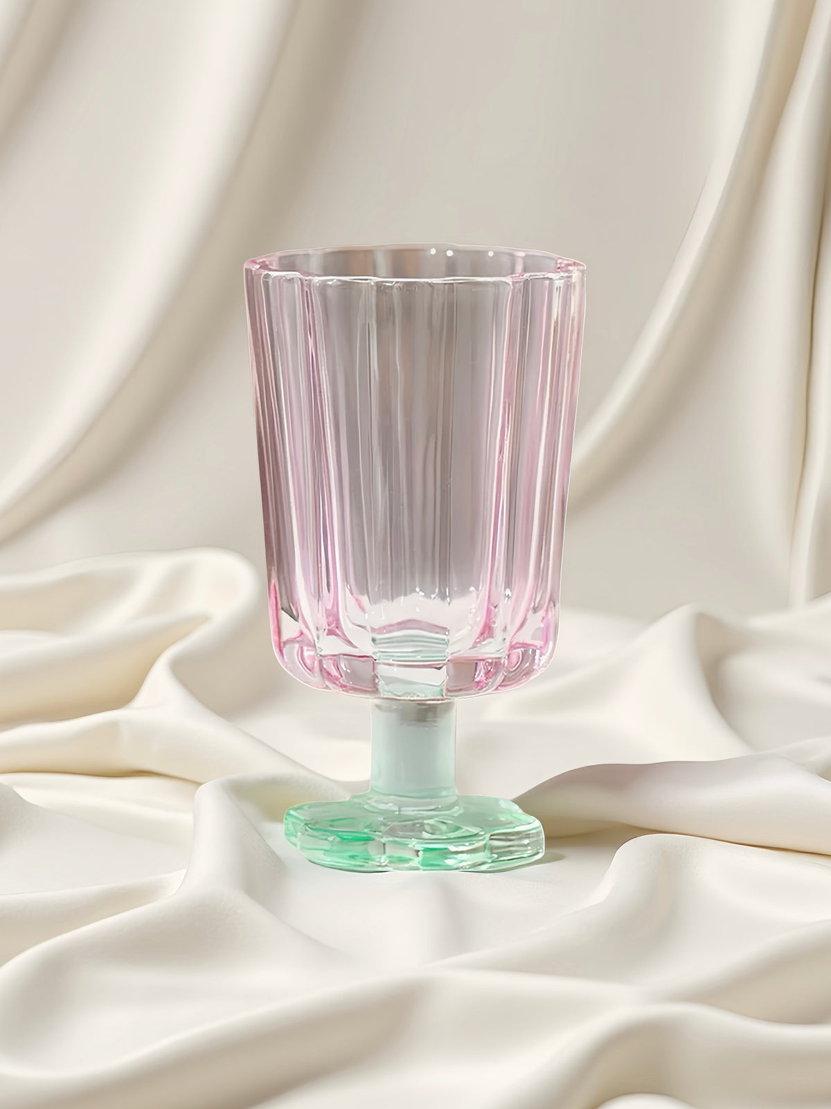 Clear pink petal goblet with flared rim and mint base with short stem