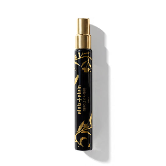 Travel perfume roller bottle with gold spray top and black body