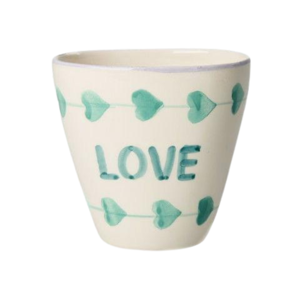 Ceramic oval cup with hand-painted green LOVE, white with teal bow pattern.