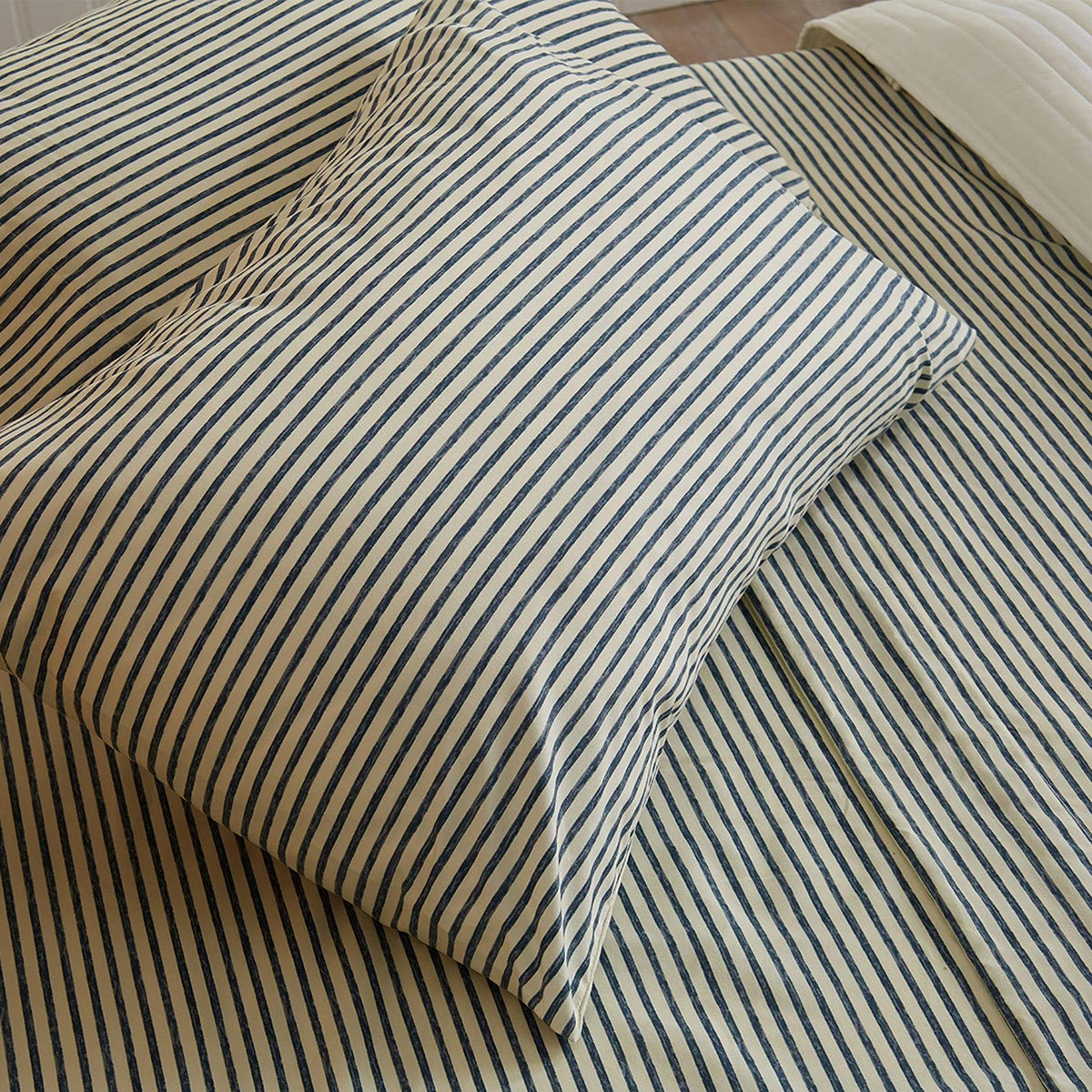 Blue striped microfiber pillowcase and sheet folded set with matching stripes