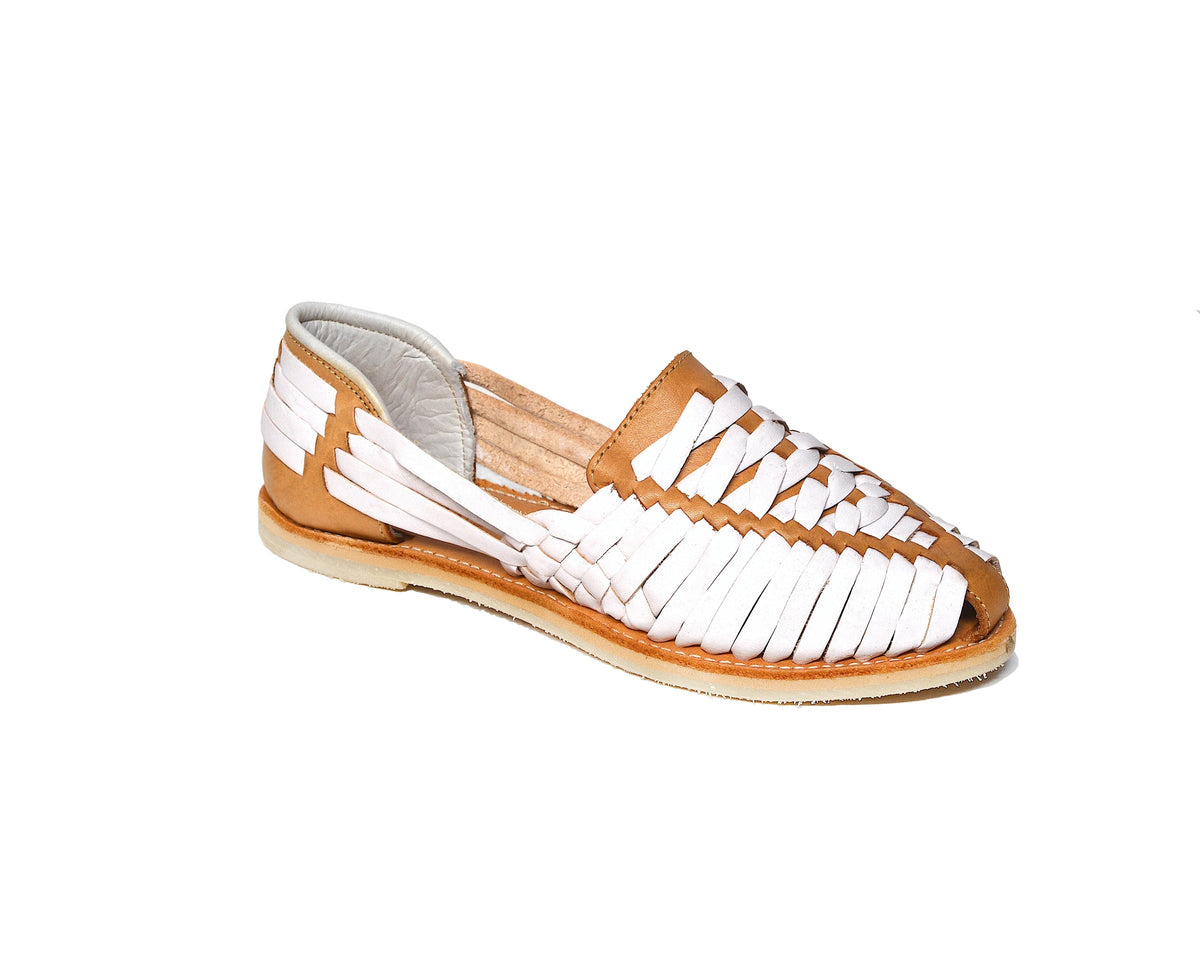 Women’s cross-woven huarache sandal with white straps and tan leather sole