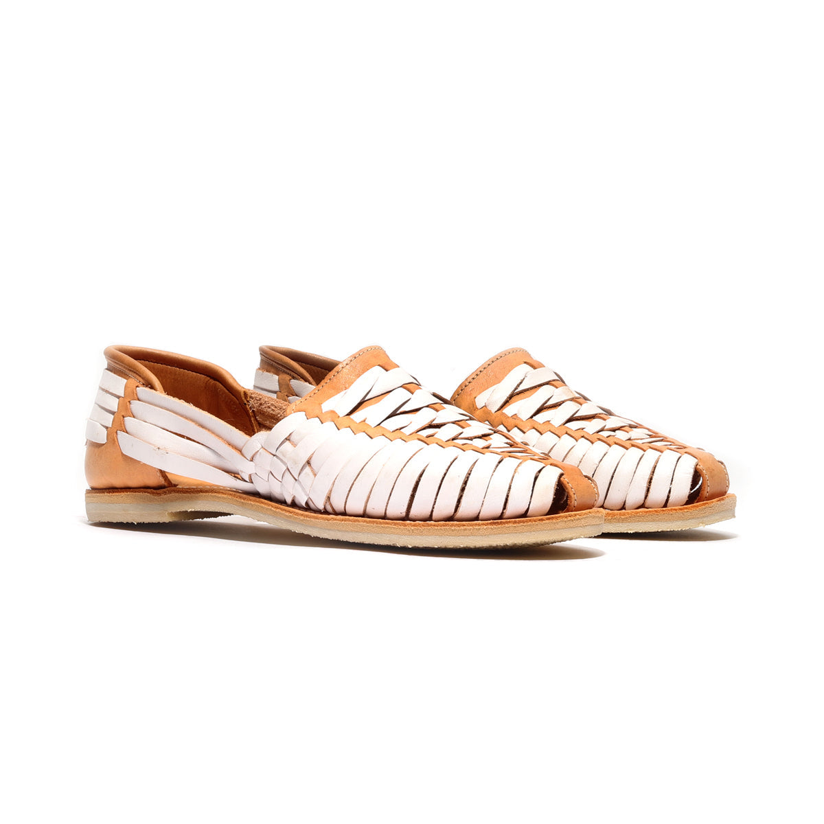 Women’s cross-woven huarache sandal in white with tan outsole and slip-on fit