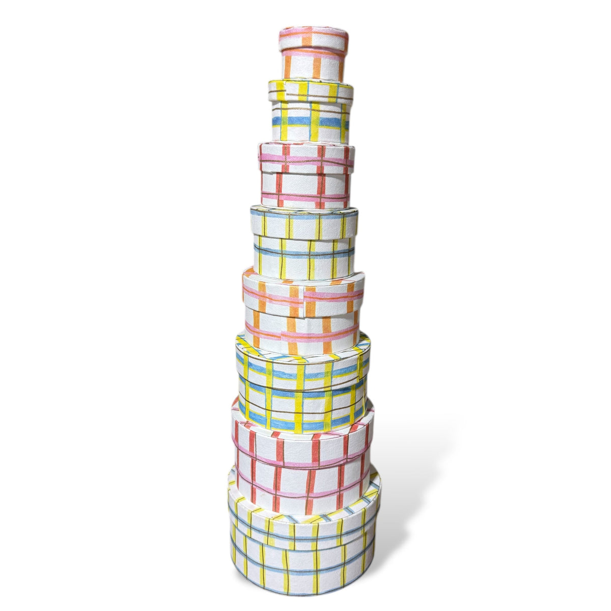Round nesting gift boxes set of handmade recycled paper, stacked in multicolor plaid bands.