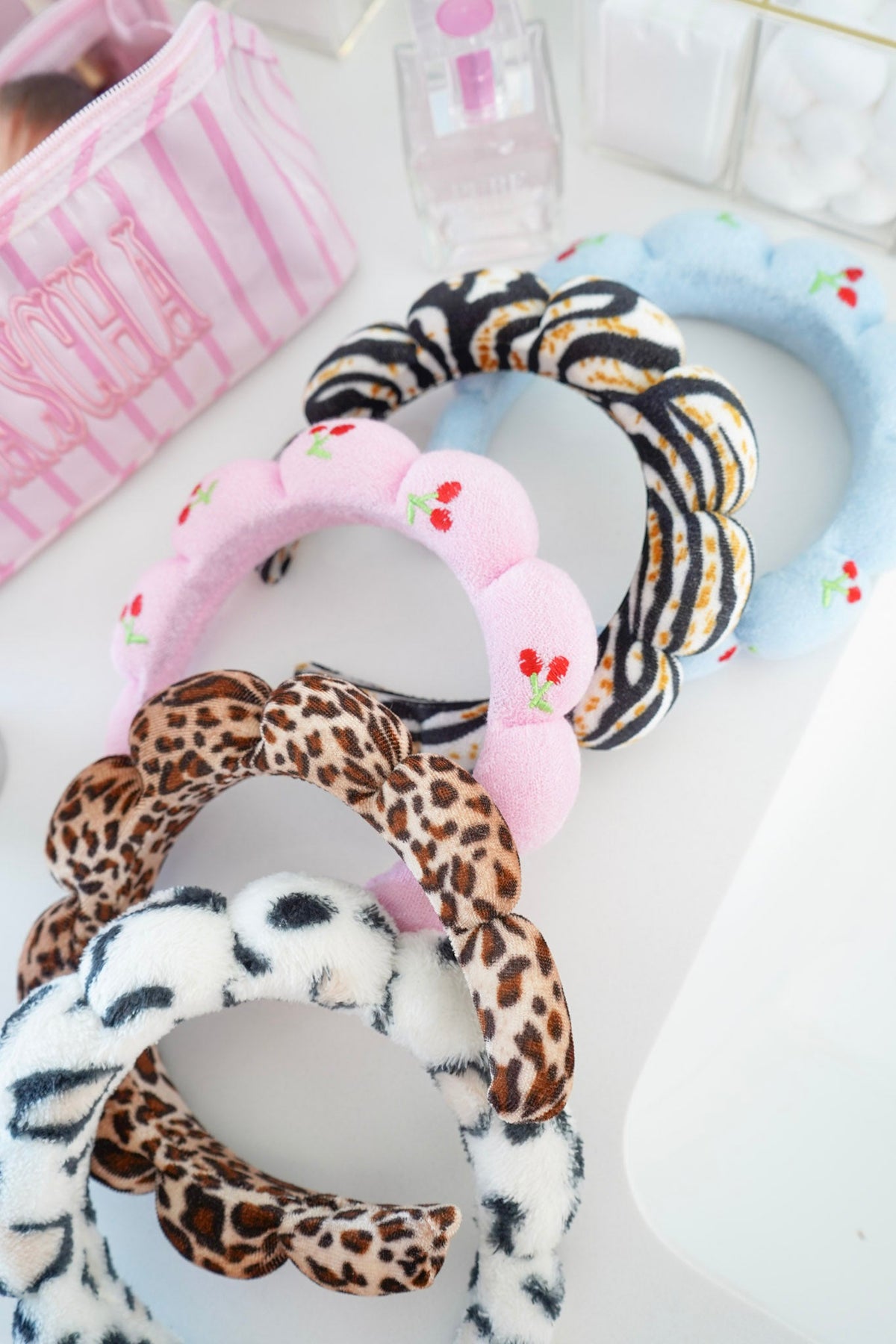 Plush braided headband set with leopard, black zebra, and pink cherry patterns