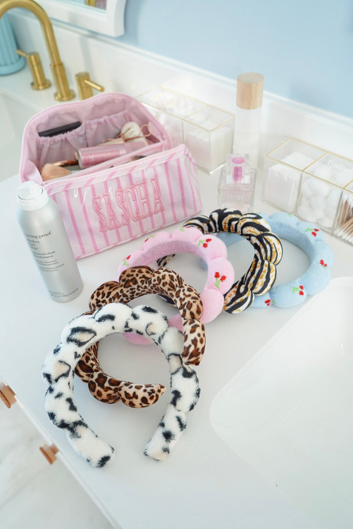 Plush fabric headbands set on tray: light blue, pink, leopard and zebra prints
