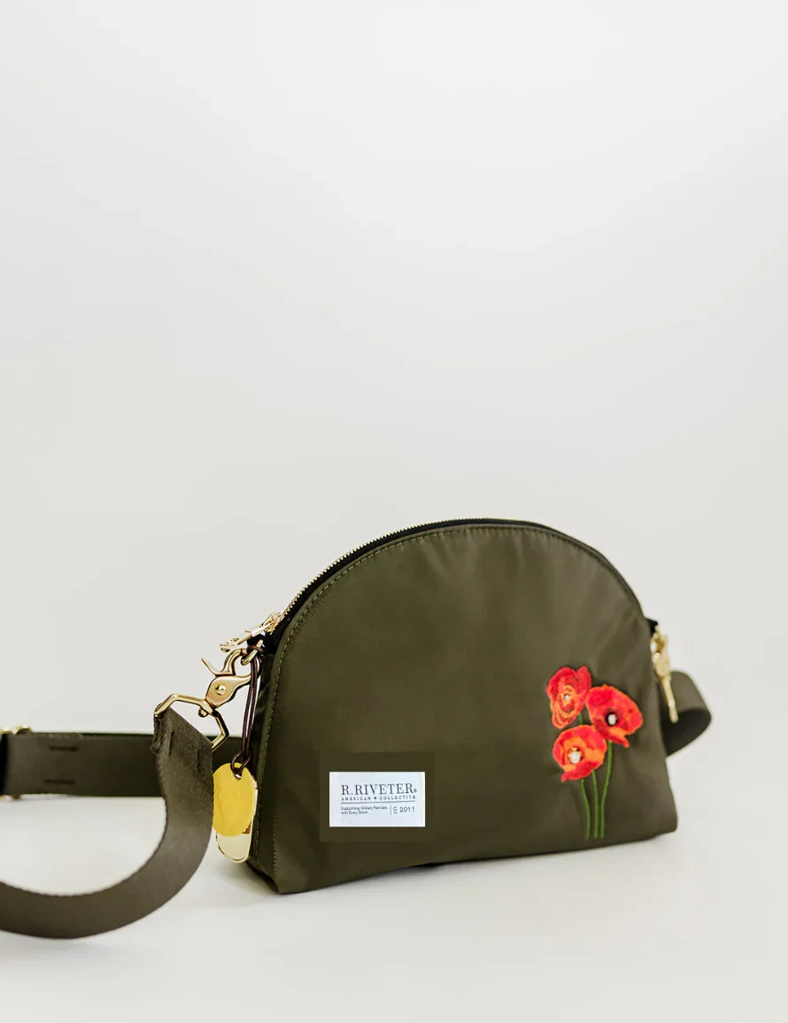 Olive nylon dome crossbody bag with red poppy embroidery and gold zipper hardware