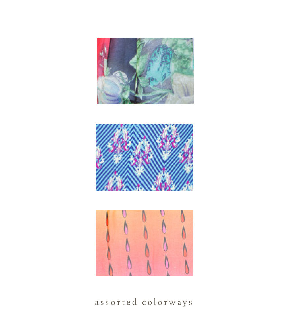 Cotton holiday stocking fabric swatches in blue, pink, and orange hand block prints