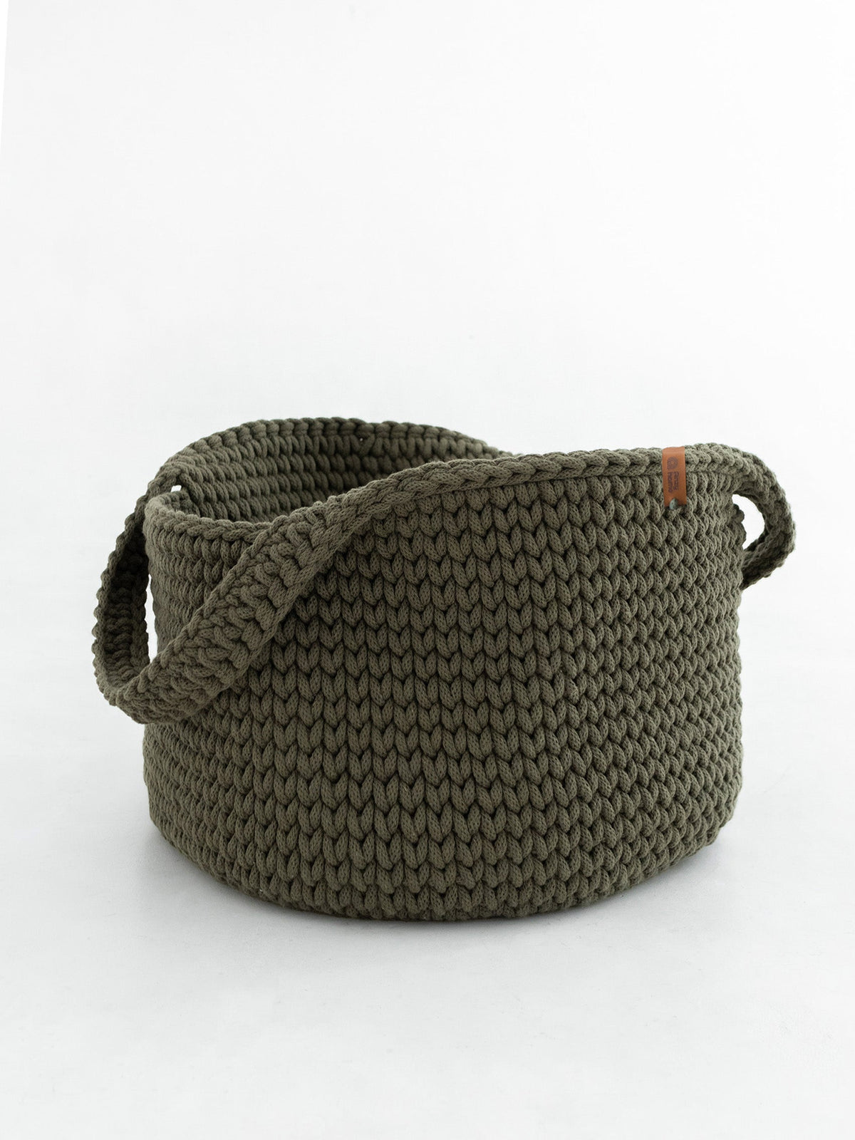 Round woven basket with handles, olive-green knit texture.
