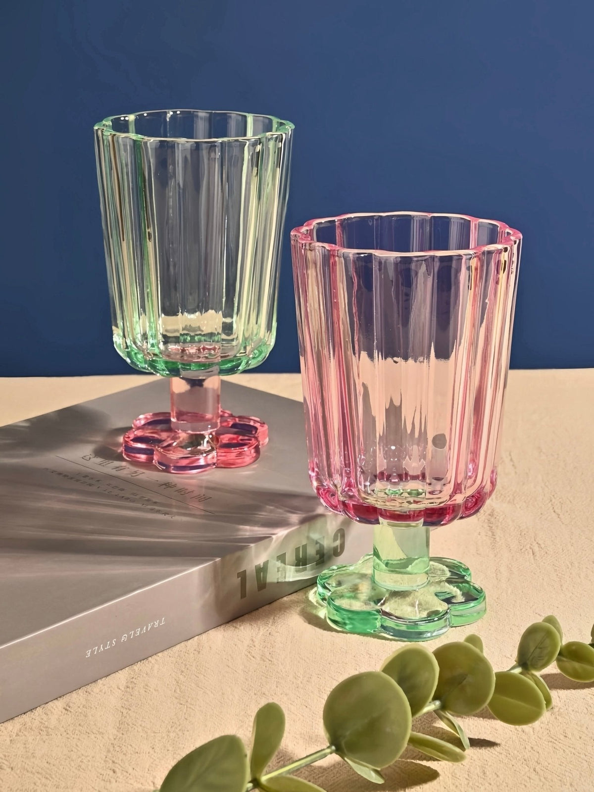 Hand-blown petal goblet glasses, clear mint and pink, with jeweled colored bases.