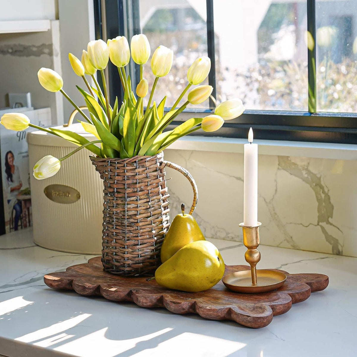 Yellow tulip bouquet with green stems and leaves