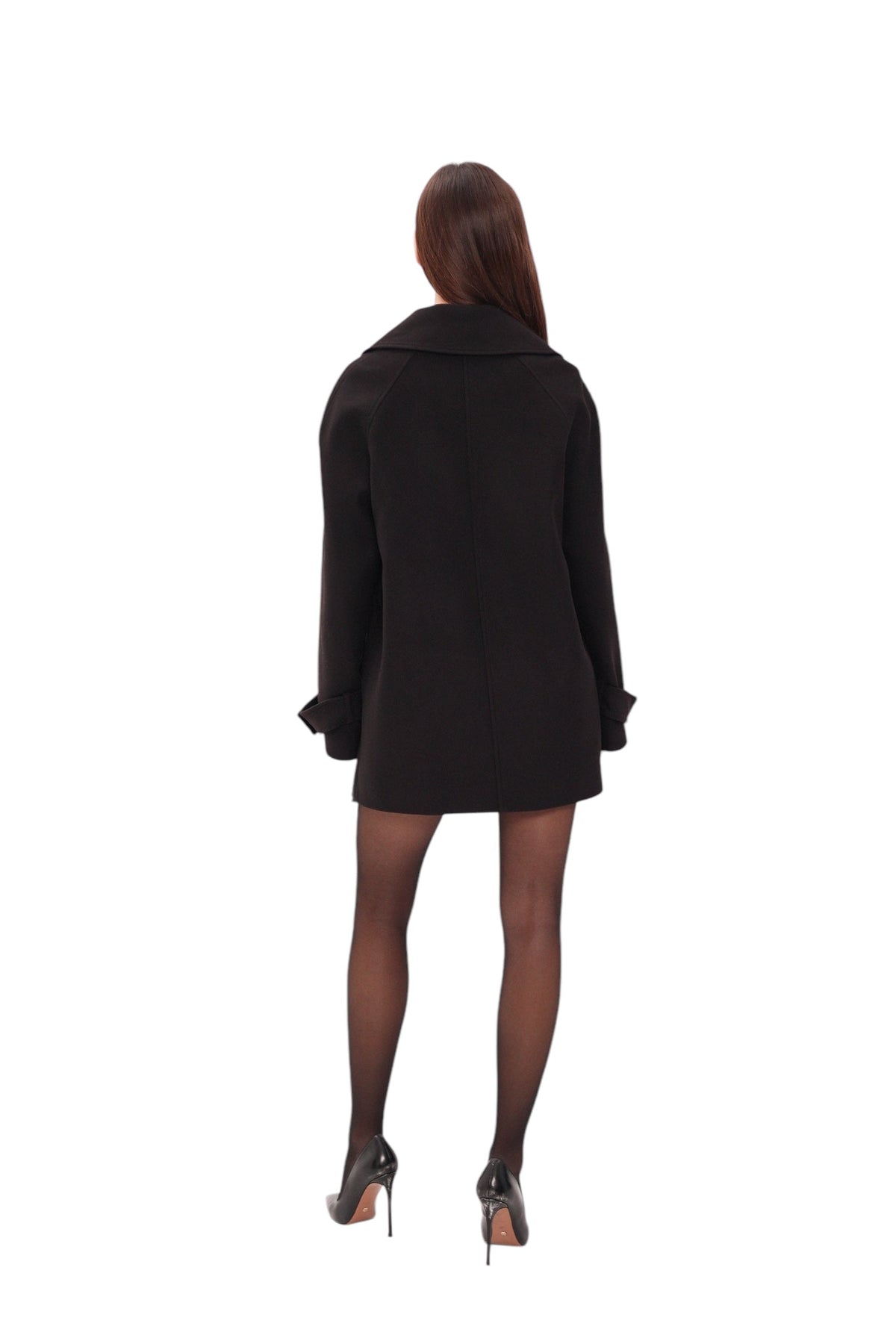 Back view of black midi coat showing its straight cut and wide collar